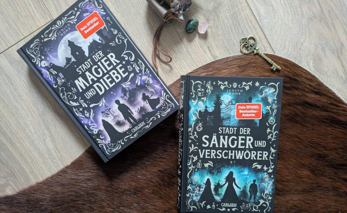 Als Taschendieb hat Cor bisher in seinem Leben wenig Freundlichkeiten und Güte erfahren. Vor allem nicht, nachdem er von der Polizei geschnappt und verurteilt wurde! Doch als er als Arbeitssklave an einen Magier verkauft wird, beginnt für Cor ein neues Leben: Er hilft nicht nur bei den Ermittlungen rund um Diebstähle und Morde, sondern erhält selbst Unterricht in Magie. Schon bald kommt Cor mit Hilfe seiner Zauber und seinem Wissen über die Diebesgilde den Tätern auf die Spur. Doch schafft er es auch, seine Freundin Ro vor den Gefahren in der Stadt zu beschützen und seinen entführten Meister zu retten? "Stadt der Magier und Diebe" von Judith Mohr ist der Auftakt einer fantastischen Krimi-Dilogie voller Herzenswärme und Freundschaft. Ein absolutes Lesehighlight ab 12 Jahren.
